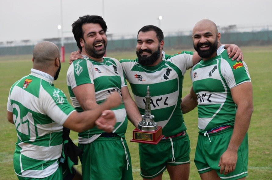 Islamabad Jinns lifting the Azadi Cup wearing BOOMFA's first kit — the Markhor Edition.